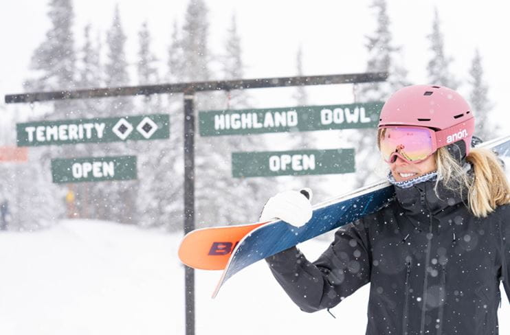 A skier entering Highland Bowl